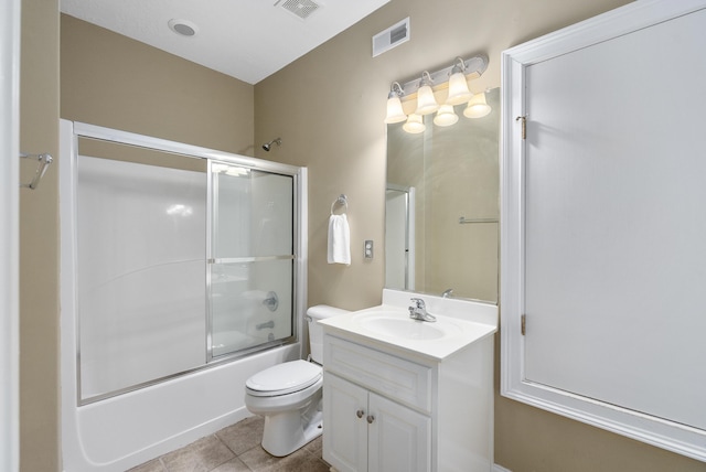 403 Ascot Dr, Aiken, SC 29803 - bathroom featuring vanity, toilet, tile patterned floors, combined bath / shower with glass door, and visible vents