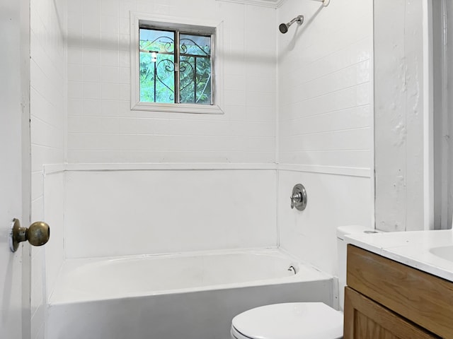 full bath with toilet, vanity, and washtub / shower combination