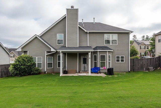 205 Langfuhr Way, North Augusta, SC 29860 - rear view of house with a patio, a chimney, and a shingled roof