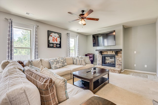 3374 Grove Landing Cir, Grovetown, GA 30813 - living area with ceiling fan, a fireplace, baseboards, and light carpet