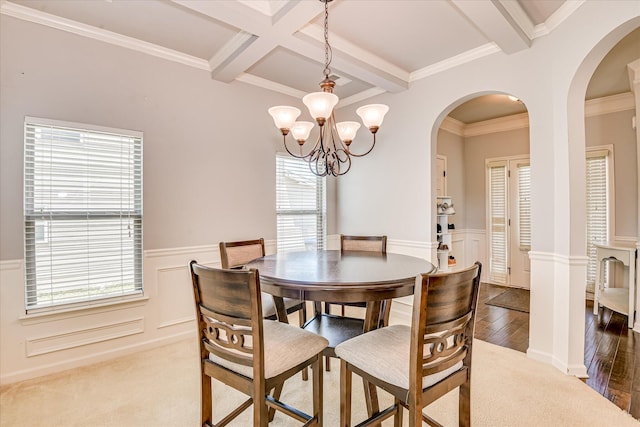 3374 Grove Landing Cir, Grovetown, GA 30813 - dining space with beamed ceiling, arched walkways, wainscoting, plenty of natural light, and a chandelier