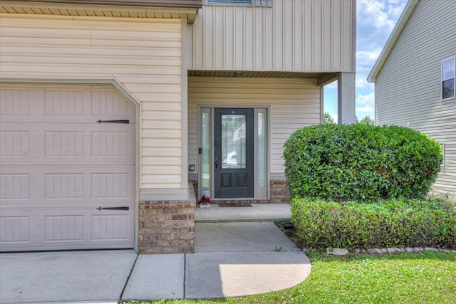 3374 Grove Landing Cir, Grovetown, GA 30813 - view of exterior entry featuring board and batten siding and brick siding