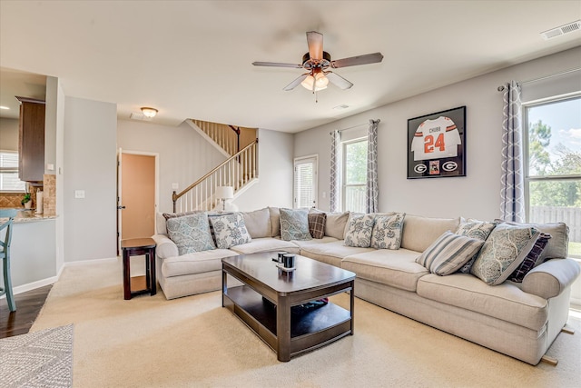 3374 Grove Landing Cir, Grovetown, GA 30813 - living area with a ceiling fan, stairs, baseboards, and carpet flooring