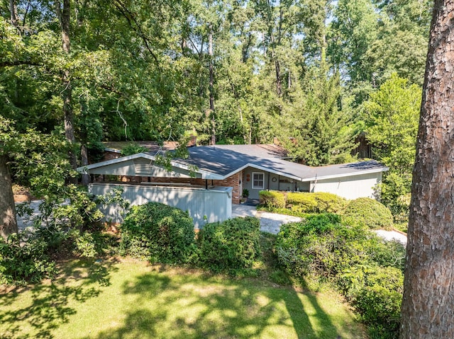 view of front of home with a front yard