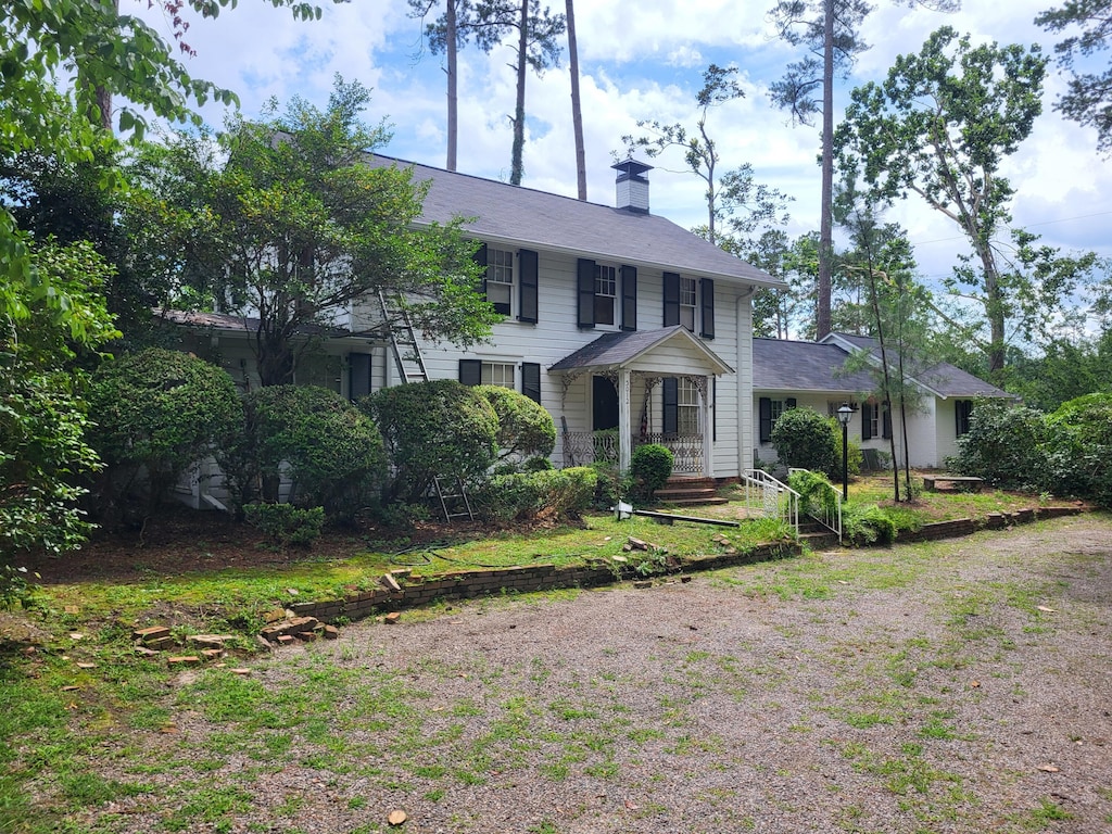 3012 Walton Way, Augusta, GA 30909 - colonial-style house featuring a chimney