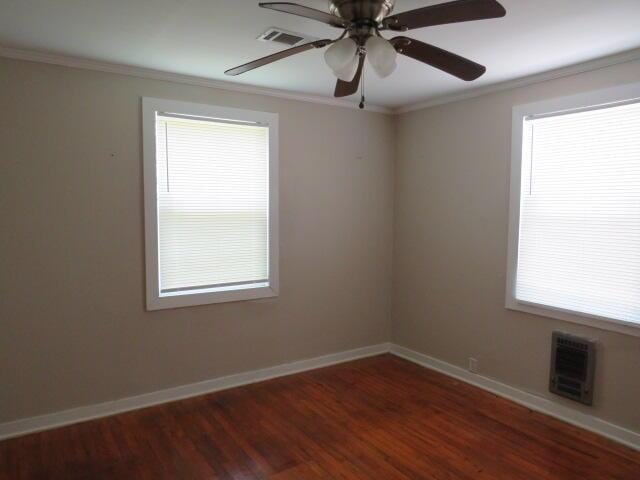 2810 Anne St, Augusta, GA 30906 - spare room with ornamental molding, wood finished floors, and a ceiling fan