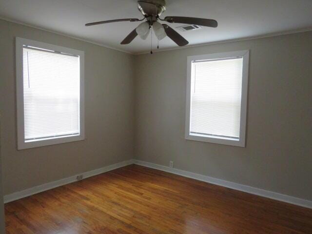 2810 Anne St, Augusta, GA 30906 - spare room featuring ornamental molding, wood finished floors, and a ceiling fan