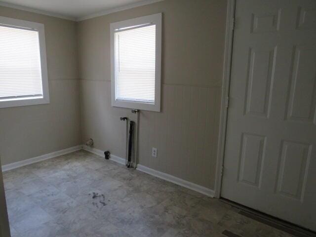 2810 Anne St, Augusta, GA 30906 - empty room with tile patterned floors and ornamental molding