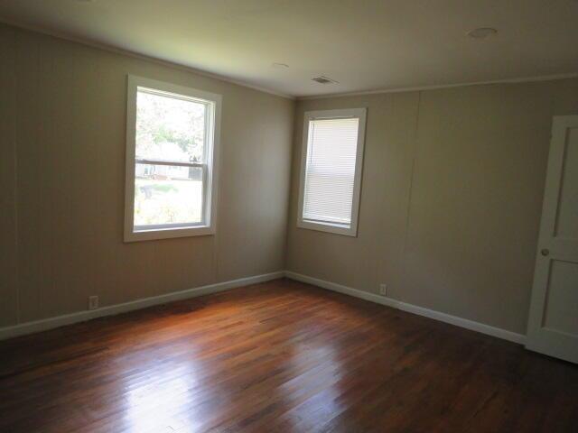 2810 Anne St, Augusta, GA 30906 - unfurnished room featuring wood finished floors and crown molding