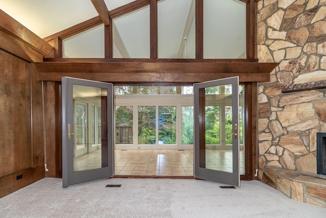 705 Woodgate Ct, Augusta, GA 30909 - doorway featuring high vaulted ceiling, carpet, wood walls, and beamed ceiling