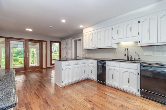 705 Woodgate Ct, Augusta, GA 30909 - kitchen featuring dishwasher, a peninsula, white cabinetry, recessed lighting, and dark stone countertops