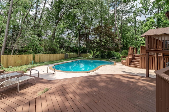 705 Woodgate Ct, Augusta, GA 30909 - view of pool with a deck, a fenced backyard, a patio area, view of scattered trees, and stairway