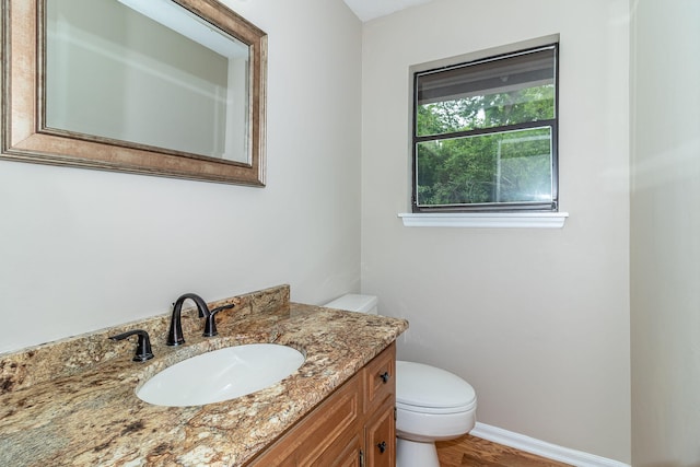 705 Woodgate Ct, Augusta, GA 30909 - half bathroom featuring vanity and wood finished floors