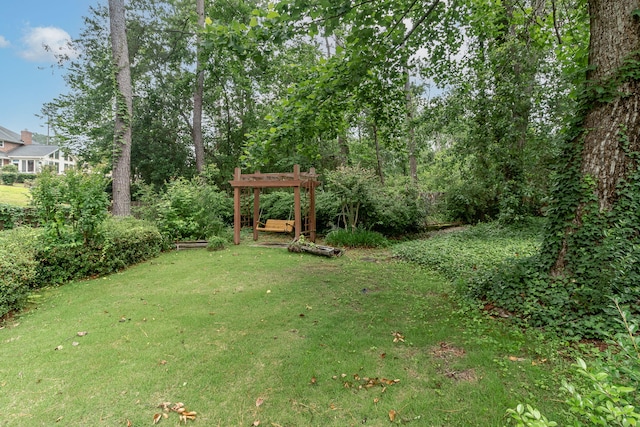 705 Woodgate Ct, Augusta, GA 30909 - view of grassy yard with a pergola