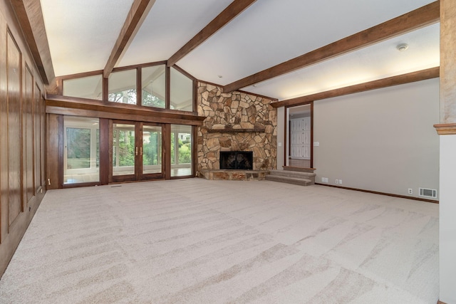 705 Woodgate Ct, Augusta, GA 30909 - unfurnished living room featuring a stone fireplace and carpet flooring