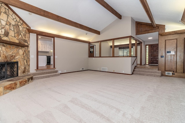 705 Woodgate Ct, Augusta, GA 30909 - unfurnished living room featuring a stone fireplace and carpet