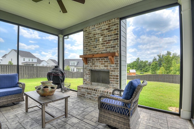 508 Oakley Grv Cir, Evans, GA 30809 - sunroom / solarium with ceiling fan and an outdoor living space with a fireplace