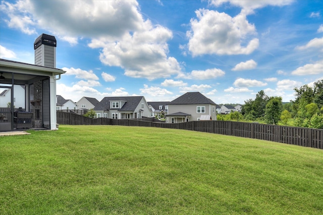 508 Oakley Grv Cir, Evans, GA 30809 - fenced backyard featuring a residential view and a sunroom