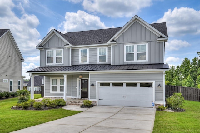 508 Oakley Grv Cir, Evans, GA 30809 - view of front of property with board and batten siding, a porch, driveway, a standing seam roof, and roof with shingles