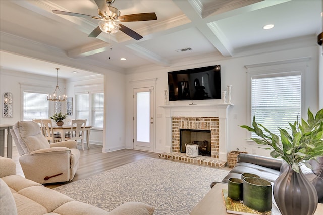 508 Oakley Grv Cir, Evans, GA 30809 - living room with coffered ceiling, wood finished floors, beam ceiling, crown molding, and a ceiling fan