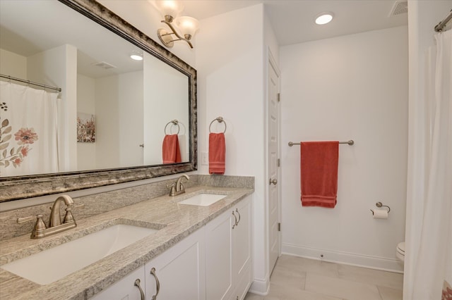 508 Oakley Grv Cir, Evans, GA 30809 - bathroom featuring double vanity and recessed lighting