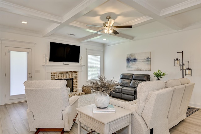 508 Oakley Grv Cir, Evans, GA 30809 - living room featuring coffered ceiling, ceiling fan, beam ceiling, light wood-style floors, and crown molding