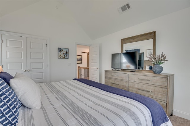 508 Oakley Grv Cir, Evans, GA 30809 - carpeted bedroom with lofted ceiling and a closet