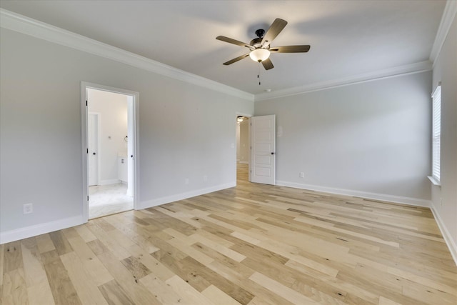 6135 Mottled Duck Dr, North Augusta, SC 29860 - empty room featuring crown molding, ceiling fan, light wood-style flooring, and baseboards