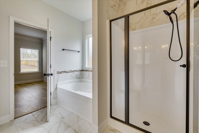 6135 Mottled Duck Dr, North Augusta, SC 29860 - full bathroom with marble finish flooring, a garden tub, a stall shower, baseboards, and ornamental molding