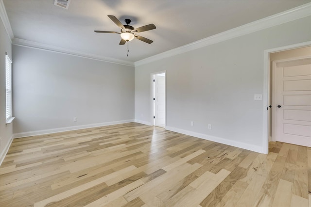 6135 Mottled Duck Dr, North Augusta, SC 29860 - spare room featuring crown molding, a ceiling fan, light wood-style floors, and baseboards