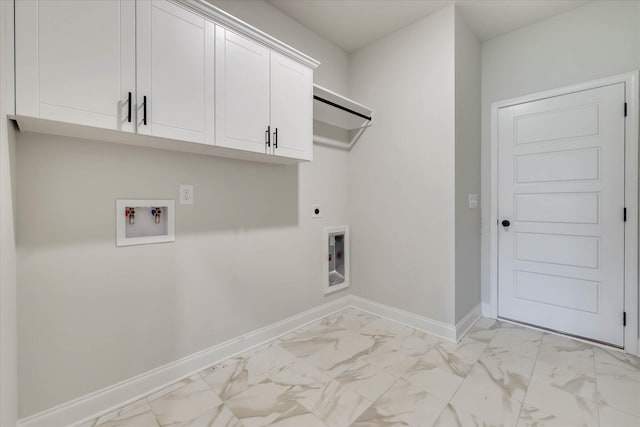 6135 Mottled Duck Dr, North Augusta, SC 29860 - laundry room featuring electric dryer hookup, hookup for a washing machine, light marble finish flooring, cabinet space, and baseboards