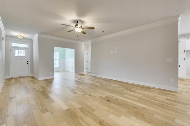 6135 Mottled Duck Dr, North Augusta, SC 29860 - unfurnished living room featuring crown molding, light wood finished floors, a ceiling fan, and baseboards