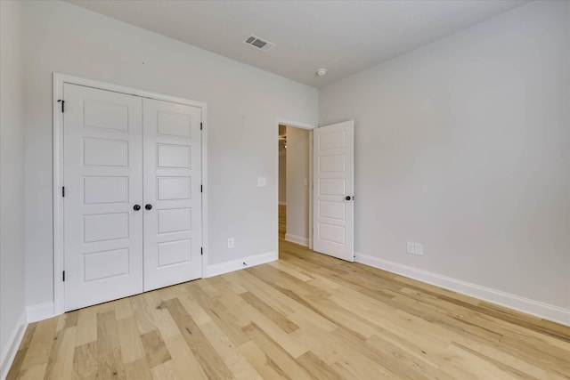 6135 Mottled Duck Dr, North Augusta, SC 29860 - unfurnished bedroom featuring light wood-style floors, baseboards, and a closet