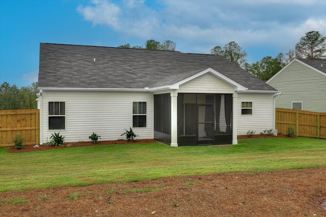 6135 Mottled Duck Dr, North Augusta, SC 29860 - rear view of house featuring a sunroom and roof with shingles