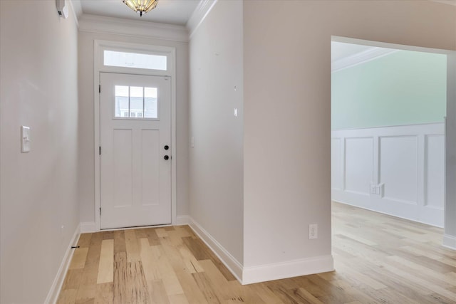 6135 Mottled Duck Dr, North Augusta, SC 29860 - foyer with light wood finished floors, ornamental molding, and baseboards