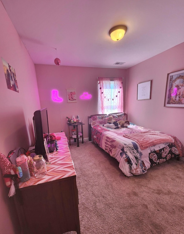 bedroom featuring visible vents and carpet floors