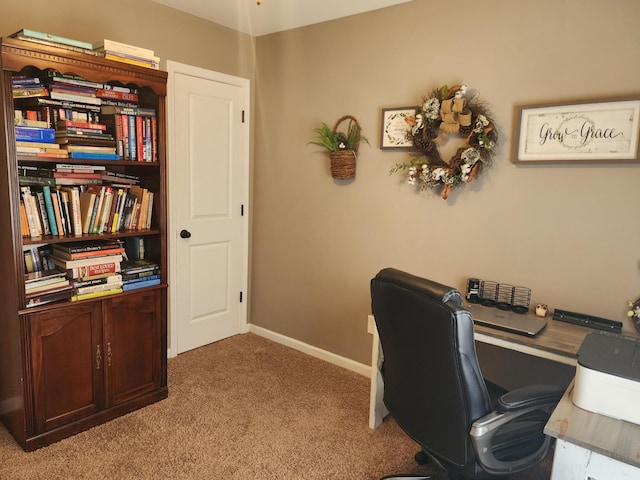 office featuring light colored carpet and baseboards