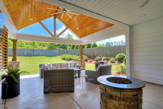 385 Bridle Path Rd, North Augusta, SC 29860 - fenced backyard with a ceiling fan, a patio area, an outdoor living space with a fire pit, and a gazebo