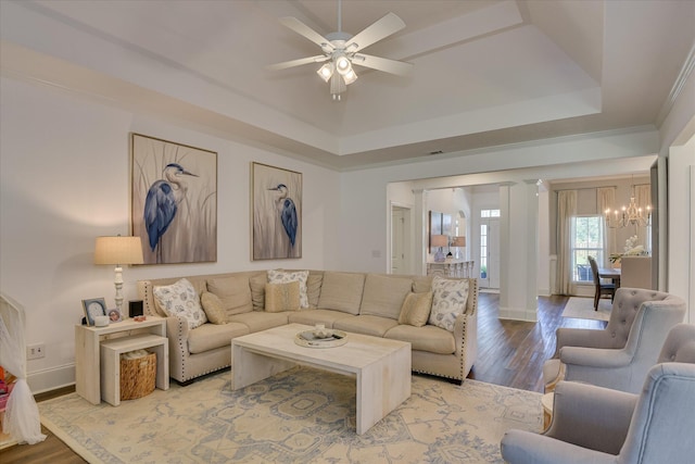 385 Bridle Path Rd, North Augusta, SC 29860 - living area featuring a chandelier, ceiling fan, wood finished floors, and a raised ceiling