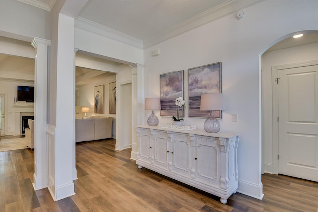 385 Bridle Path Rd, North Augusta, SC 29860 - corridor with wood finished floors, arched walkways, and ornamental molding