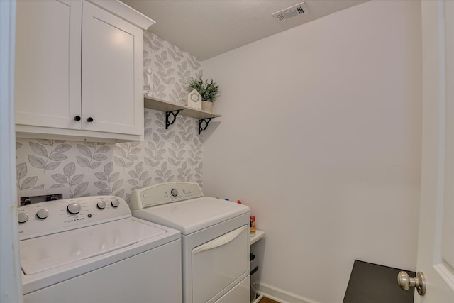 385 Bridle Path Rd, North Augusta, SC 29860 - laundry room with washing machine and dryer and cabinet space