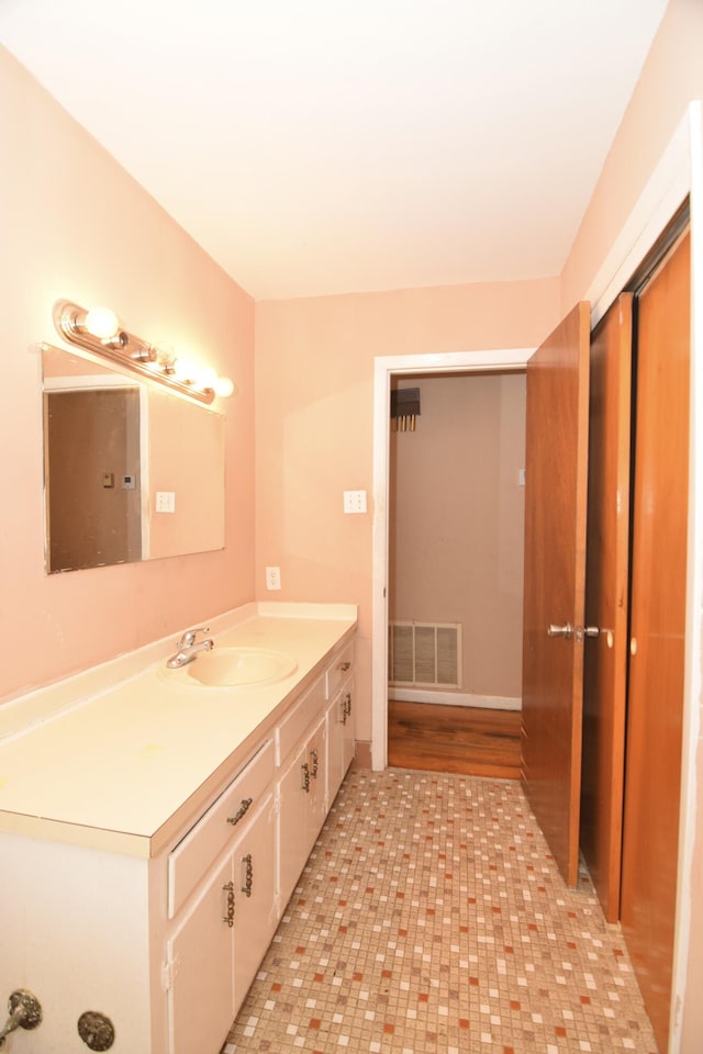 bathroom featuring visible vents and vanity