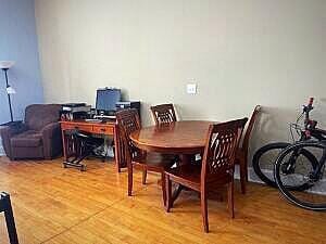 dining space with light hardwood / wood-style flooring