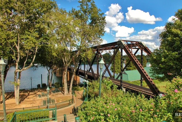 view of jungle gym with a water view