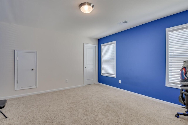 view of carpeted spare room