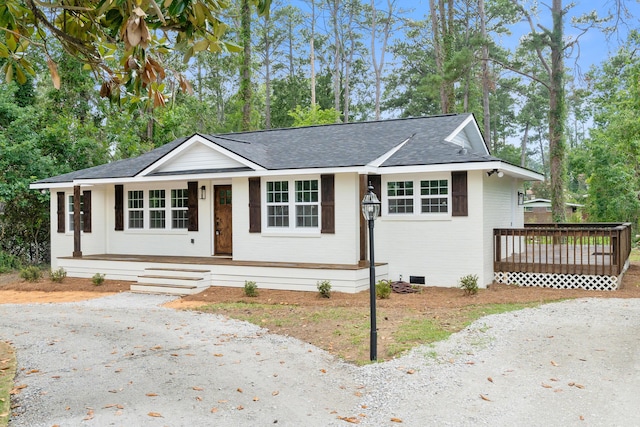 411 Warren Rd, Augusta, GA 30907 - ranch-style house featuring a porch, roof with shingles, crawl space, and brick siding
