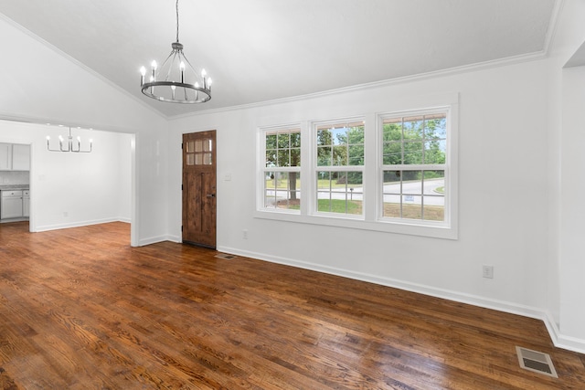 411 Warren Rd, Augusta, GA 30907 - unfurnished living room with a chandelier, crown molding, plenty of natural light, dark wood-style floors, and lofted ceiling