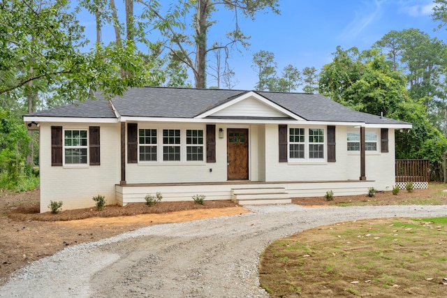 411 Warren Rd, Augusta, GA 30907 - ranch-style home with curved driveway, brick siding, and roof with shingles