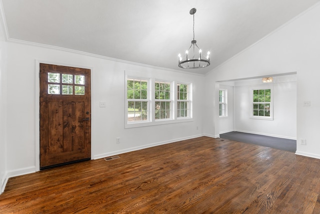 411 Warren Rd, Augusta, GA 30907 - entryway with a chandelier, healthy amount of natural light, crown molding, lofted ceiling, and dark wood finished floors