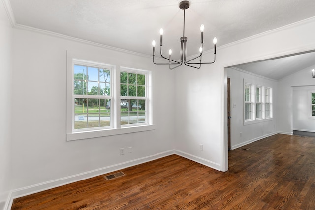411 Warren Rd, Augusta, GA 30907 - spare room with a chandelier, plenty of natural light, crown molding, dark wood-type flooring, and vaulted ceiling
